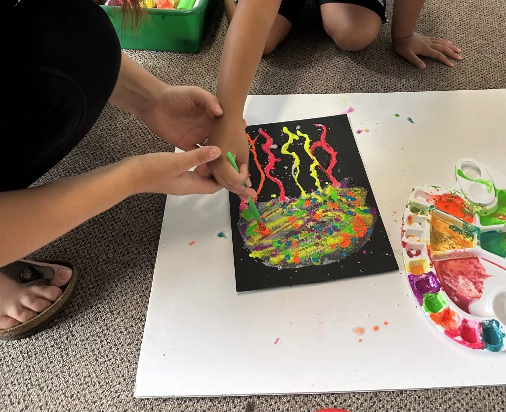 Painting Colourful Art During ABA Therapy Session